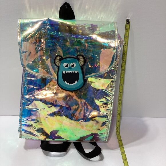 Disney Monsters Inc Iridescent Plastic Vinyl Backpack With Cloth Pouch - Picture 1 of 10